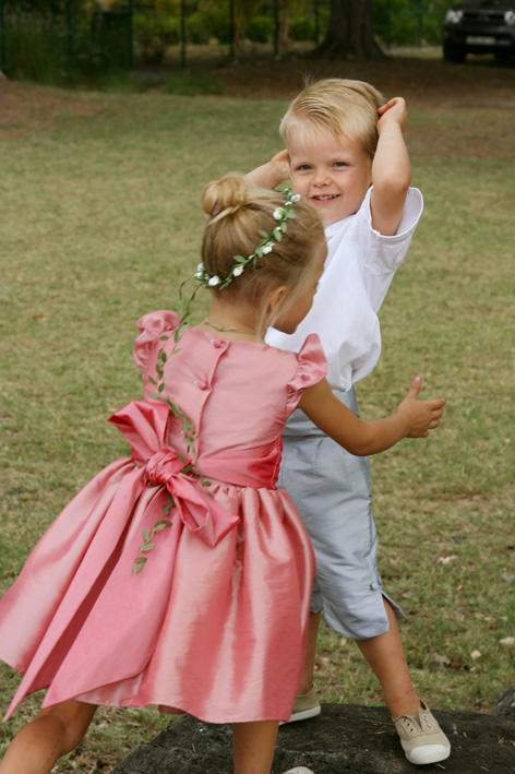 Isabella flower girl dress in pink with grey page boy outfit by designer Little Eglantine